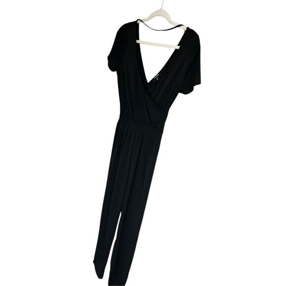 Express Sleek Black Jumpsuit - Picture 1 of 6